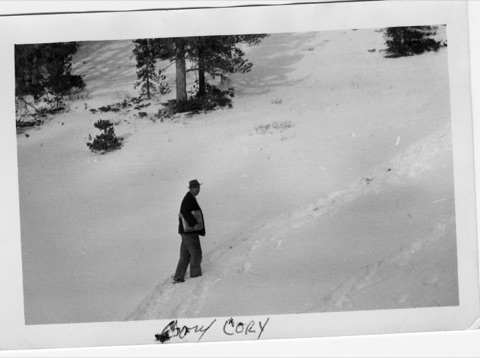 1946 Harlan Cory walking up snowy slope