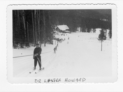 1950s Dr. Lester Howard — on the Rope Tow with the Lodge in the background