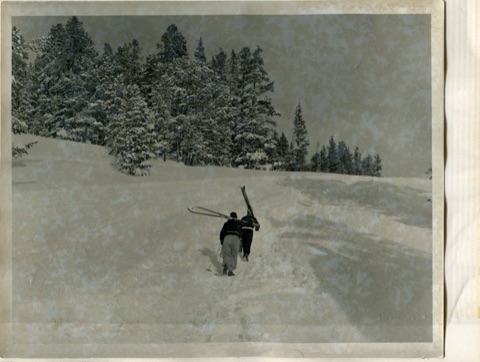 1950s Skiers Walking Up