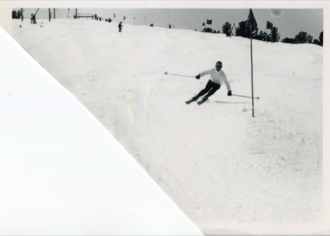 1966 Racing by a gate