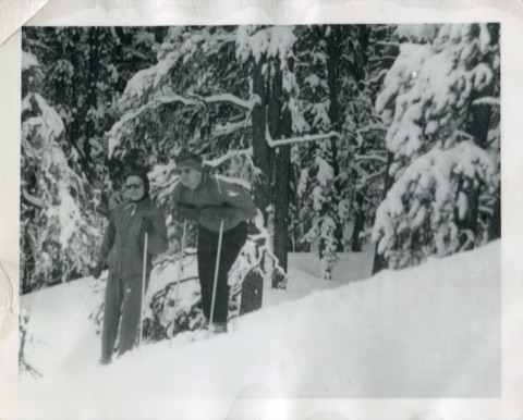 1966 Man and Woman Looking Out