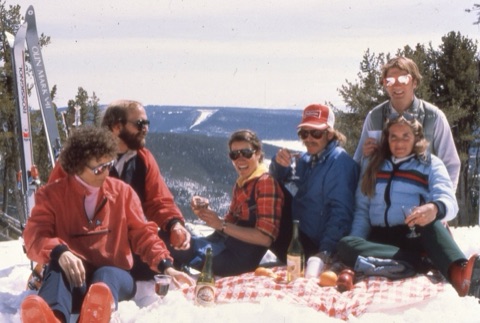 1980s People Lounging on Hill