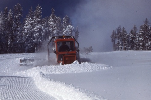 1980s Snowcat pushing snow