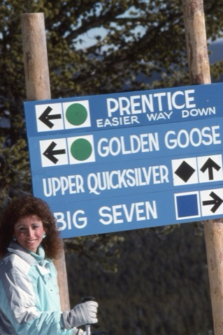 1980s unknown woman by ski sign