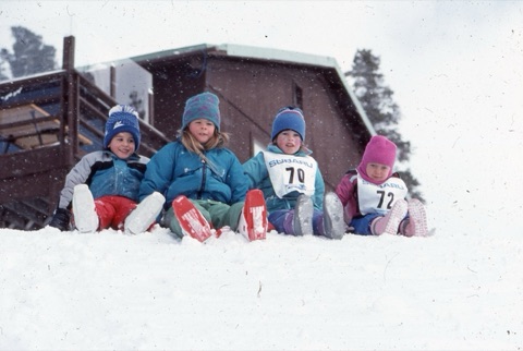 1989 kids at top of hill in snow storm near lodge
