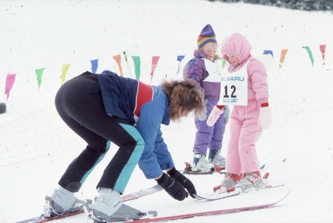 1989 unknown instructor with 2 kids in learning area on fun day
