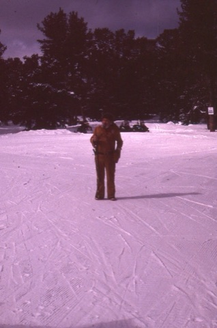1990s AJ Buzkirk standing on snow