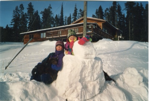 1990s Charley Willett and Tyler Meeks building a snowman that looks like ninja turtle