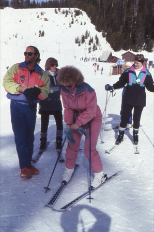 1990s Chris Quinn instructor with people near lodge 2