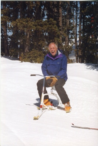1990s George Willett on Snowbike laughing
