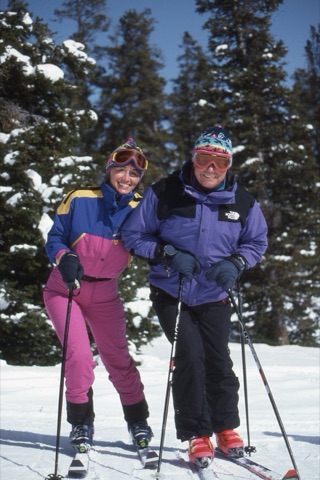 1990s Margie Willett and George Willett smiling on skiis