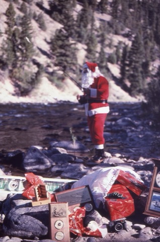 1990s Santa taking a fishing break on Belt Creek in Winter