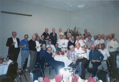 1990s Ski Club bus group at dinner