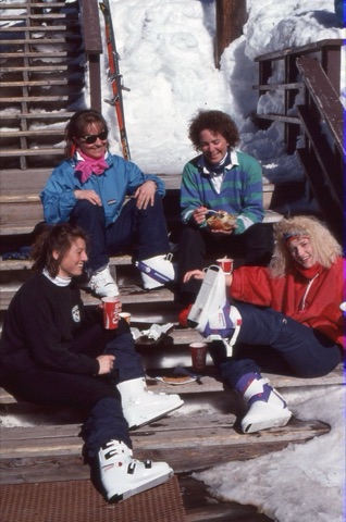 1990s Sue Gold, unknown, unknown, unknown on deck stairs relaxing in sun