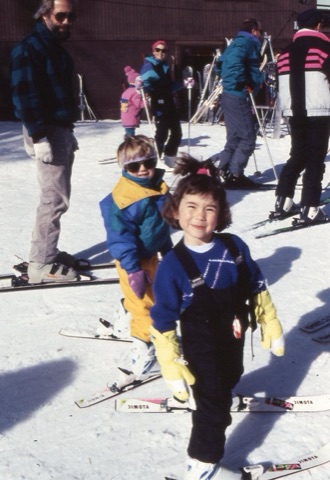 1990s unknown kid smilling, unknown kid standing, unknown man in background