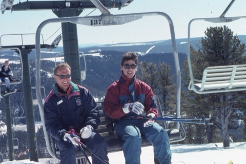 1990s unknown man and Dave Broquist on chairlift