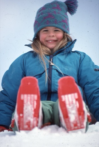1990s unknown smiling girl in snow