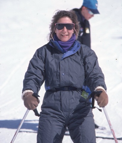 1990s unknown woman skiing and smiling