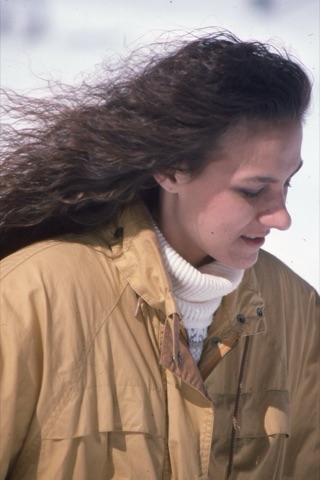 1990s unknown woman with black curly hair
