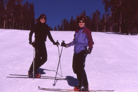 2000s Melissa Johnson and Bonnie Noble skiing and smiling