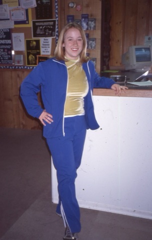 2000s unknown girl on tacky attire near ticket office