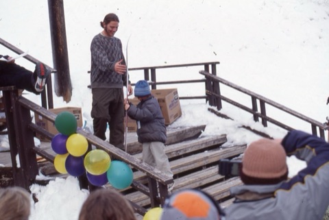 2001 Tyrel Johnson handing prizes out on deck