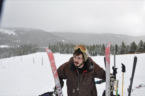 2009 Nick Boucher walking in terrain park with skis