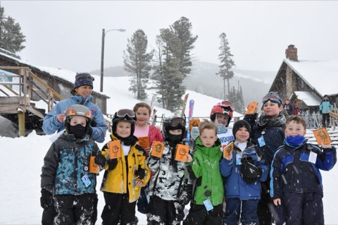 2010 Ski School team with burd pucks