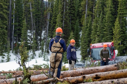 2011 Ben Haugan, Jamie Gregory, Jesse Gregory near snowcat hauling logs