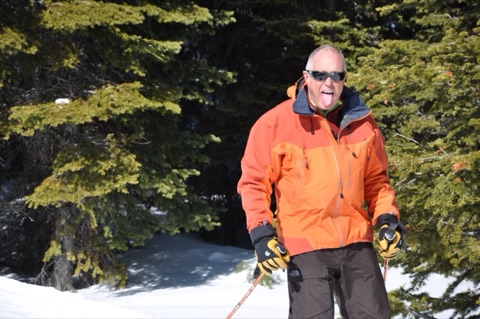 2011 George Willett with tongue out and skiing