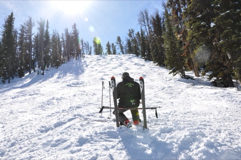 2011 Rick Jacobs sitting on ski chair while judging the bump off competion
