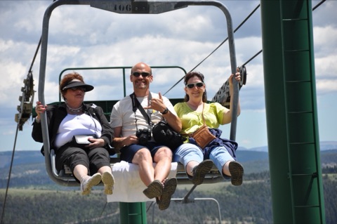 2013 3 people on chair near top of triple