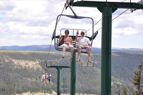 2013 man and woman on chair