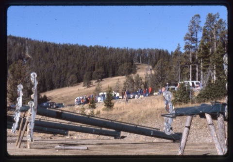 1978 Triple Chairlift Construction towers and people in parking lot