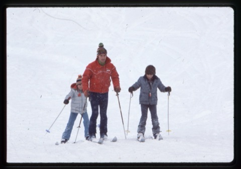 1979 Man and two kids skiing