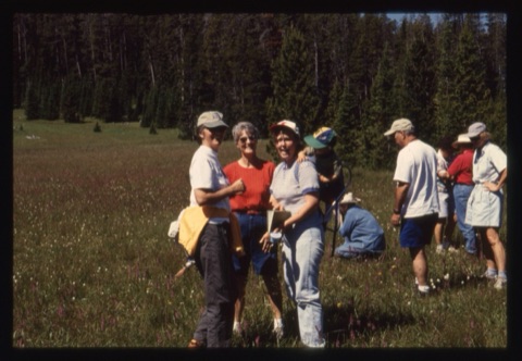 1982 Margie Willett, Kathy Kiser and group on hill in summer