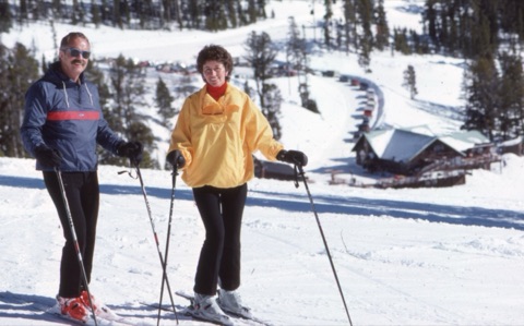 1980s George Willett, Margie Willett — With the lodge in the Background