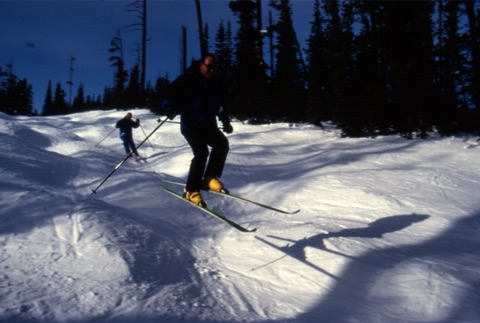 1990s Skier jumping on moguls