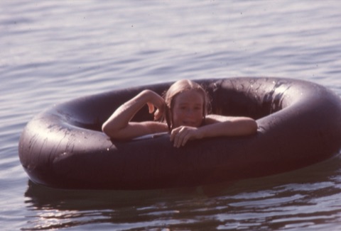 1976 Katie on Intertube in the lake