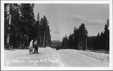 1938 2 people standing on Kigns Hill pass after plow - Dontated by Carla A. Hunt