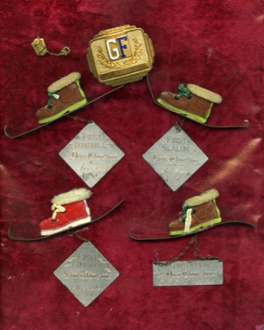 1940 Dan Thorson collection of pins for skiing events - Donated by Donna Wahlberg