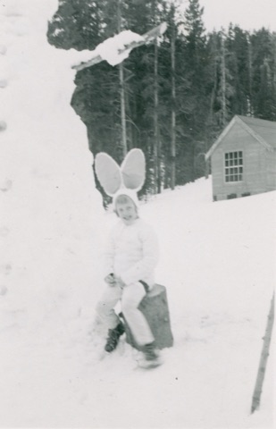 1951 Jan Throckmorton — Sitting with a giant snowman