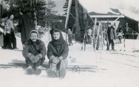 1951 Lydia Nettles sitting in front of the lodge
