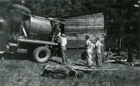 1952 5 men preparing to pour cement