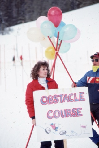 1989 Woman with obstacle course sign - Frank Ball Photo