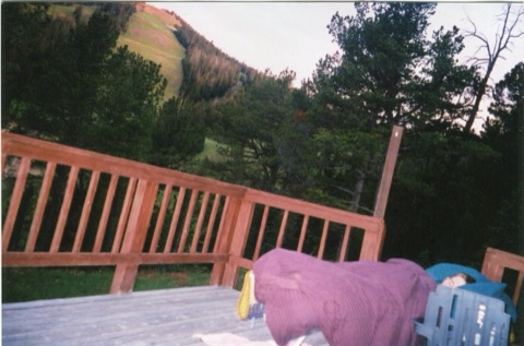 1990s Charley Willett — The Showdown House — Camping on the porch in the summertime