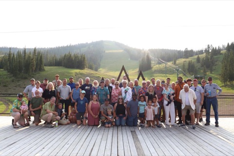 2024 Lodge Deck — Ski Patrol group photo with the mountain in the background
