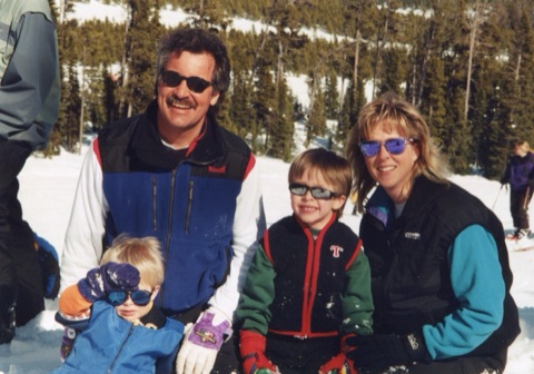 1990s Jim Gold, Pam Gold, Christopher Gold, Taylor Gold — Outside the lodge — Gold Family Photo