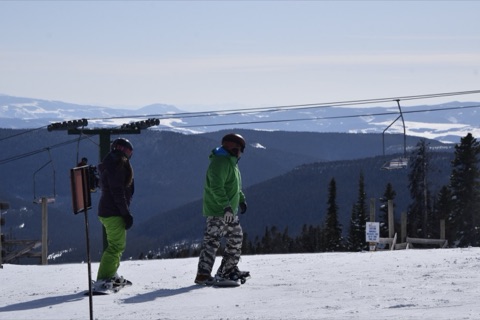 unknown people on top of the mountain