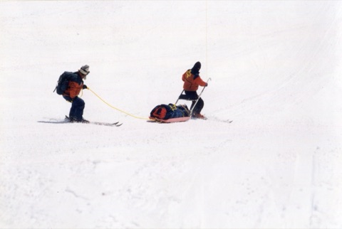 1999 Stan King, Ski Patrollers — Hauling on a Toboggan